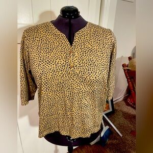 Kim Rogers’ animal print top